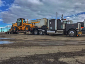 Motorgrader-heavy-equipment-hauling-free-quotes-ship-experts