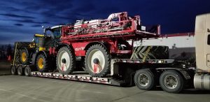 Pal-HC-Sparyer-And-Tractor-shipping-equipment-canada-us-cross-border-drivers-action