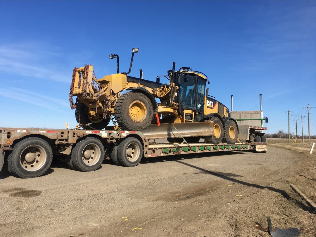 heavy-equipment-load-cross-border-us-canada-machinery