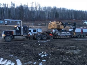 heavy-equipment-load-cross-border-us-canada-machinery-trusted-dispatch-shipping