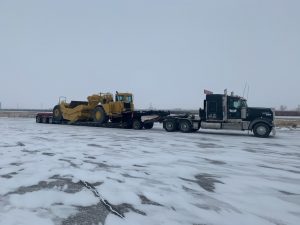 Scraper-Load-trusted-dispatch-canada-shipping-heavy-equipment-company