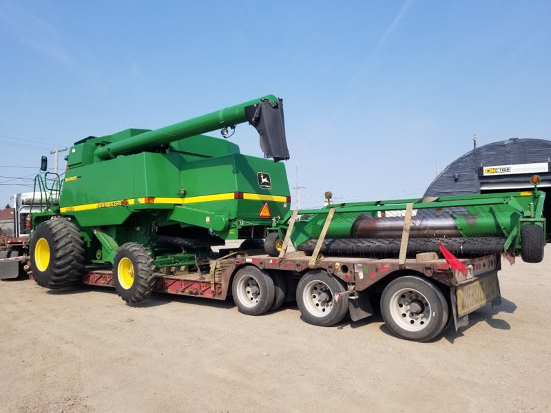 5 Questions to Ask Before Transporting a Combine Harvester from Auction