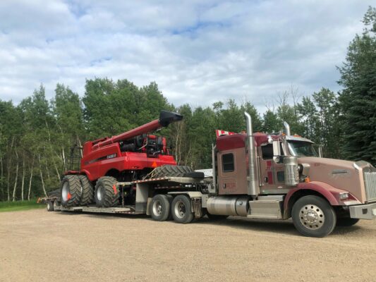 What Type of Heavy Haul Trailers Are Used for Shipping Farming Equipment?